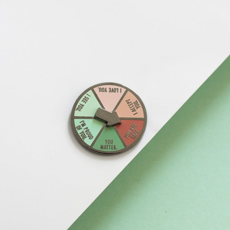 RETIRING Inner Child Interactive Spinner Enamel Pin