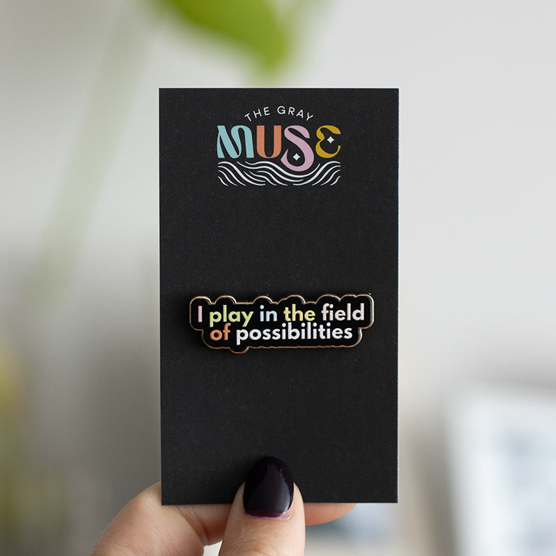 RETIRING Play in the Field of Possibilities Text Enamel Pin