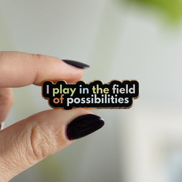 RETIRING Play in the Field of Possibilities Text Enamel Pin