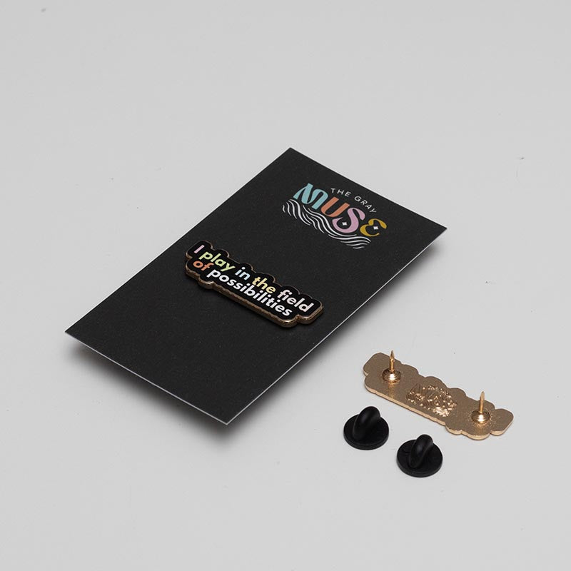 RETIRING Play in the Field of Possibilities Text Enamel Pin